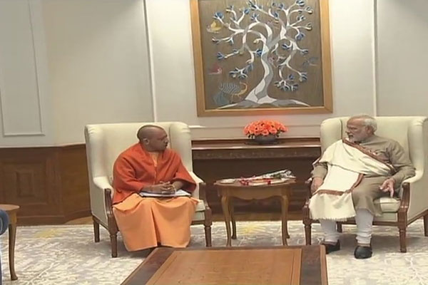 1555522030 yogi meet modi