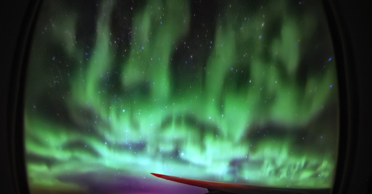 Dutch pilot captures turquoise aerial fire of Aurora Borealis