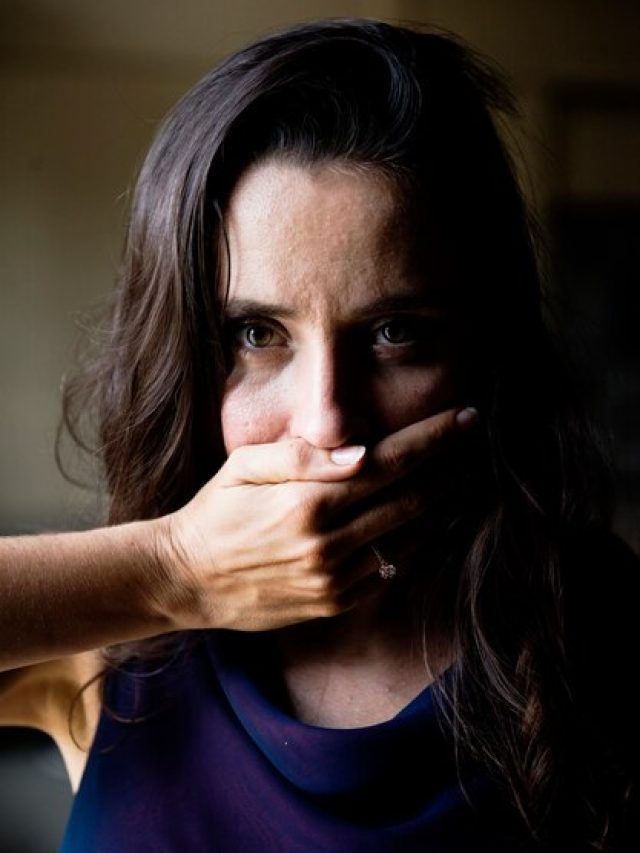 woman-with-hand-covered-her-mouth_53876-23533
