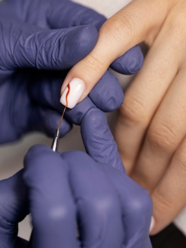 nail-art-professional-working-client-nails_23-2149265954