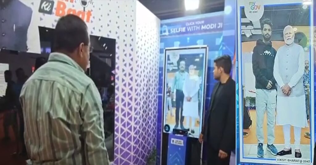1364333 selfie with PM Modis digital avatar at IITF