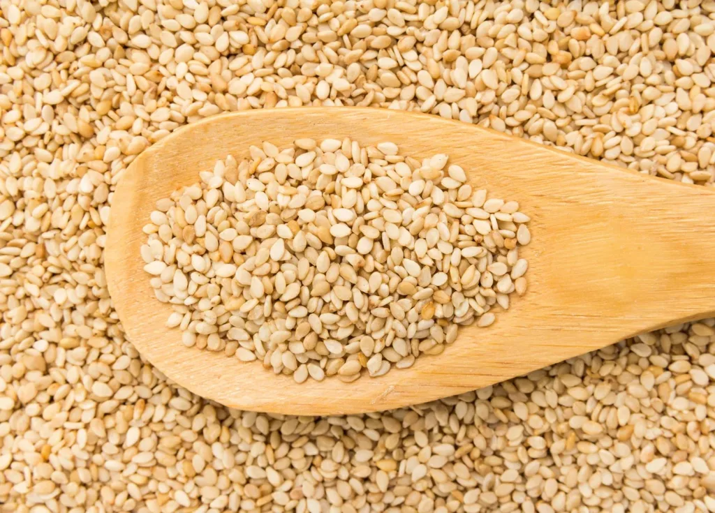 1367241 sesame seeds wooden spoon