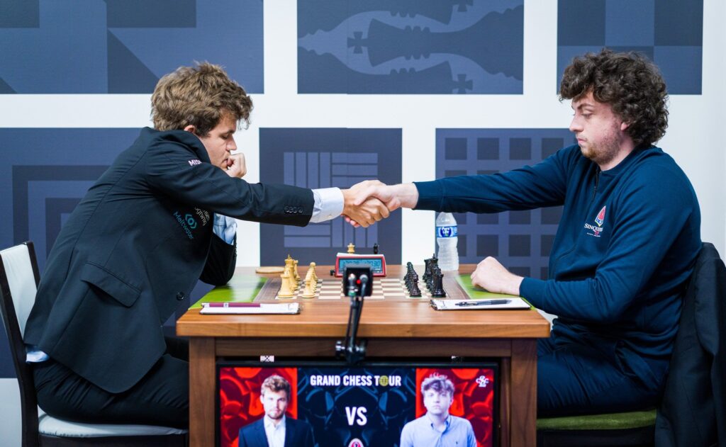 1376841 Hans Niemann with Magnus Carlsen