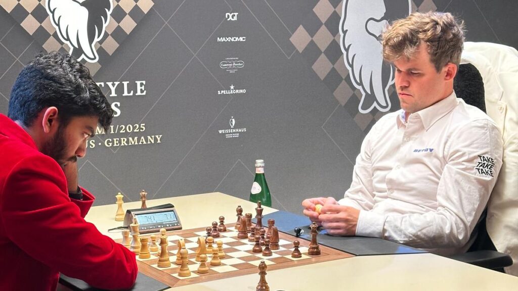 1382409 Magnus Carlsen and Gukesh D 3