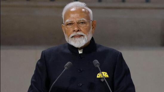 1385157 Indian Prime Minister Narendra Modi stands on stag1739298683511