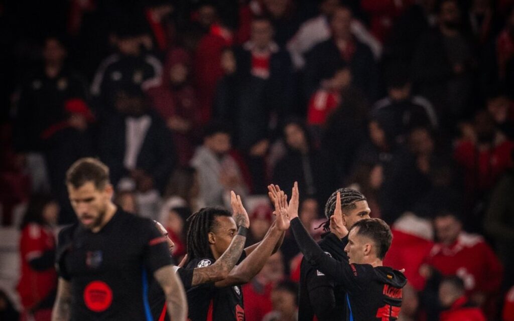 1389677 champions league ten man barcelona beat benfica liverpool stun psg in hindi