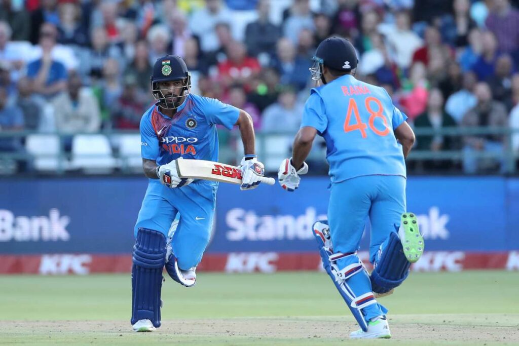 1403941 Shikhar Dhawan with Suresh Raina s