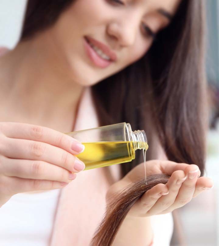 1405135 applying oil to the hair