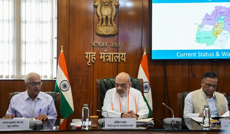 1409775 Amit shah manipur review pti