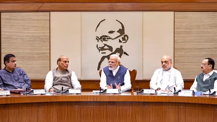 1442322 prime minister narendra modi with defence minister rajnath singh home minister amit shah and minist 070633196